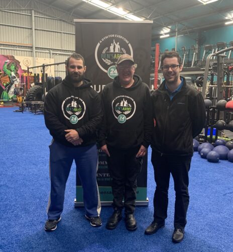 Robert standing between Ben's Army Gym owner Ben and are-able Employment Consultant Travis