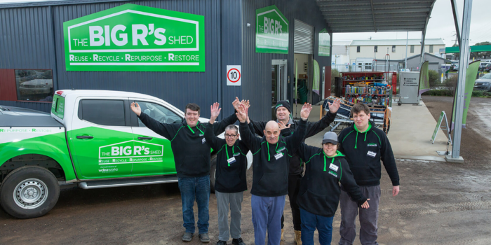 are-able Social Enterprise Business The Big R's Shed is fast becoming a thriving community hub. Staff standing in from of the shed welcoming customers in.